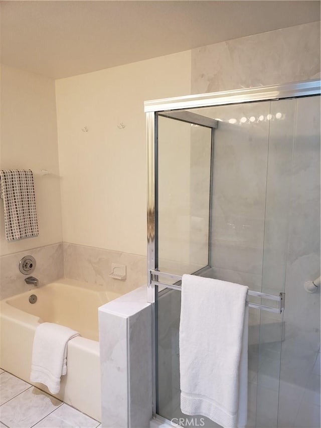 1406 Brett Pl Unit 112, San Pedro, CA 90732 - full bathroom featuring a bath, a stall shower, and tile patterned floors