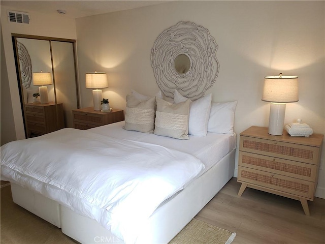 1406 Brett Pl Unit 112, San Pedro, CA 90732 - bedroom featuring wood finished floors and a closet