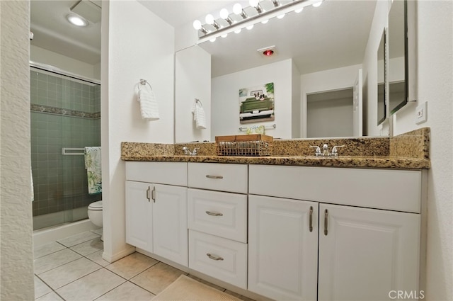 1406 Brett Pl Unit 112, San Pedro, CA 90732 - bathroom featuring double vanity, a stall shower, and tile patterned flooring
