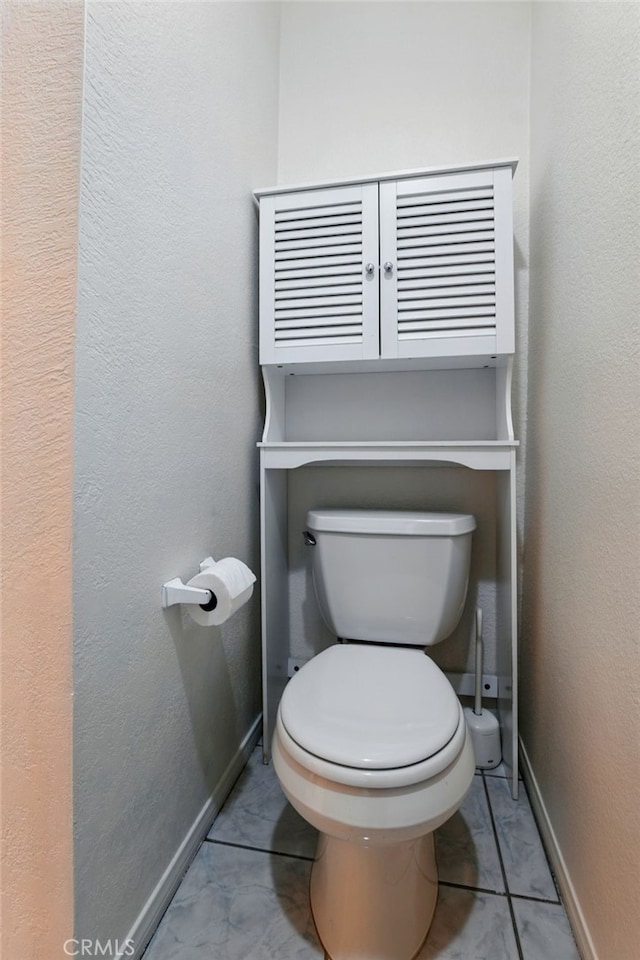 1406 Brett Pl Unit 112, San Pedro, CA 90732 - bathroom featuring toilet and baseboards