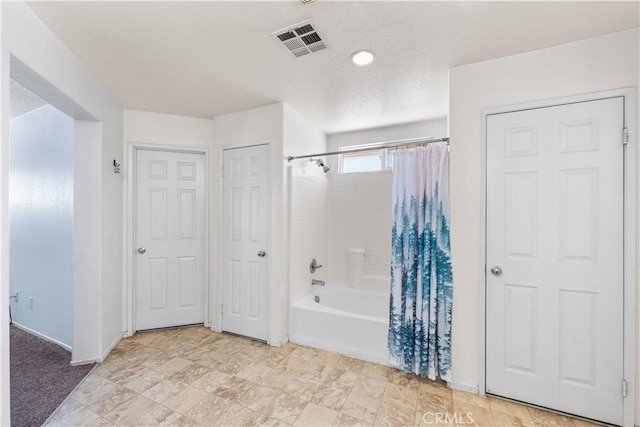 16029 White Mountain Pl, Victorville, CA 92394 - bathroom with shower / tub combo and baseboards
