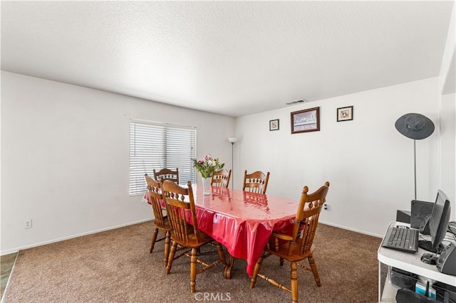 16029 White Mountain Pl, Victorville, CA 92394 - carpeted dining area featuring a textured ceiling and baseboards