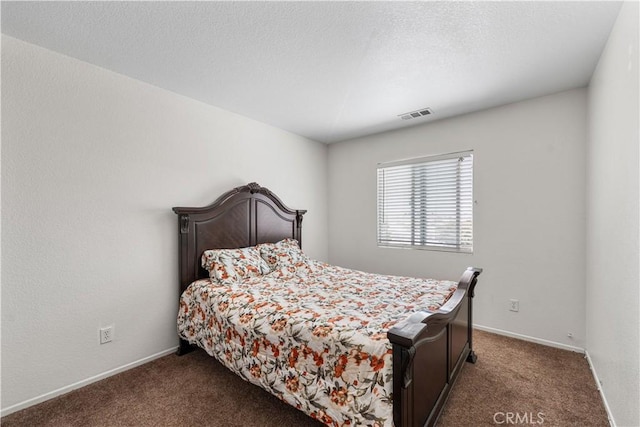 16029 White Mountain Pl, Victorville, CA 92394 - bedroom featuring dark colored carpet and baseboards