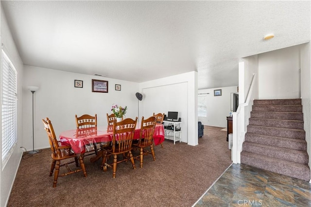 16029 White Mountain Pl, Victorville, CA 92394 - carpeted dining room with stairs