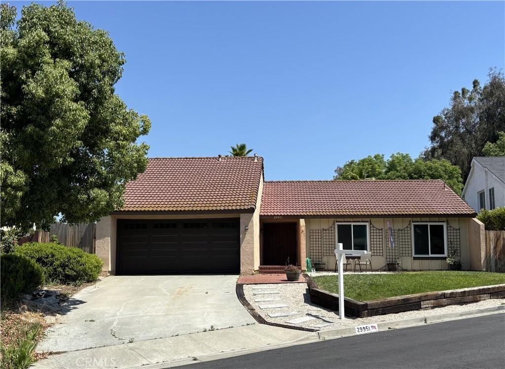 29951 Cactus Pl, Temecula, CA 92592 - ranch-style house featuring driveway, an attached garage, stucco siding, and a tile roof