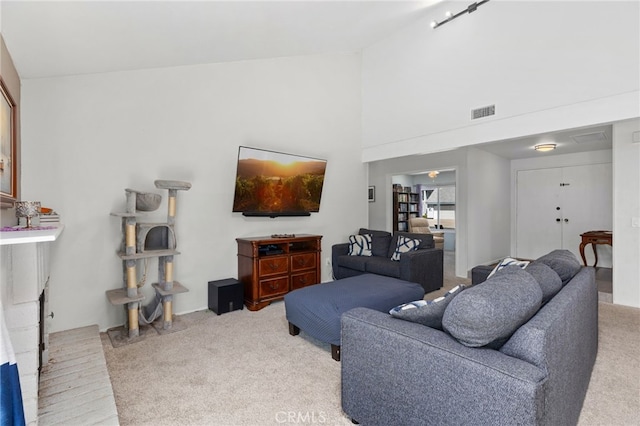 29951 Cactus Pl, Temecula, CA 92592 - carpeted living area with lofted ceiling