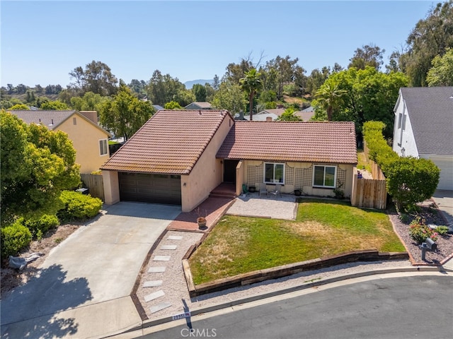 29951 Cactus Pl, Temecula, CA 92592 - view of front of property featuring a tiled roof, a garage, driveway, and stucco siding