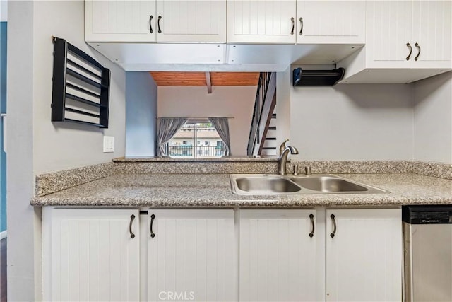 5460 White Oak Ave Unit E339, Encino, CA 91316 - kitchen with dishwasher, a sink, white cabinets, and light countertops