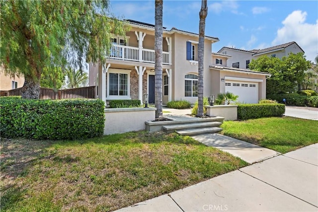 8581 Camino Limon Rd, Corona, CA 92883 - view of front of home with stucco siding, a balcony, driveway, and an attached garage