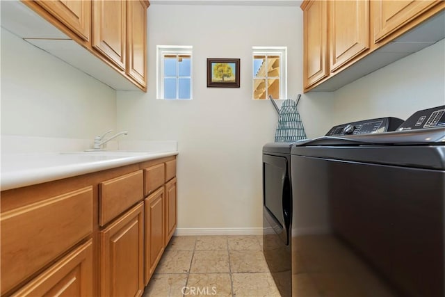 8581 Camino Limon Rd, Corona, CA 92883 - laundry room with washing machine and dryer, cabinet space, and baseboards