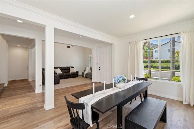 8581 Camino Limon Rd, Corona, CA 92883 - dining area featuring crown molding, light wood finished floors, baseboards, and recessed lighting