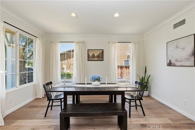 8581 Camino Limon Rd, Corona, CA 92883 - dining space with crown molding, baseboards, and light wood finished floors