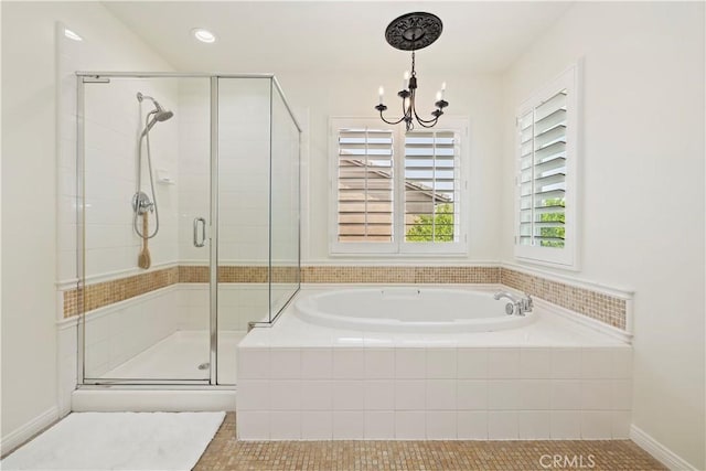 8581 Camino Limon Rd, Corona, CA 92883 - bathroom featuring a garden tub, a chandelier, a shower stall, tile patterned floors, and recessed lighting