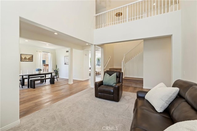 8581 Camino Limon Rd, Corona, CA 92883 - living room featuring stairway, healthy amount of natural light, wood finished floors, recessed lighting, and baseboards