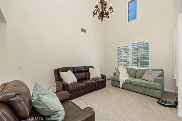 8581 Camino Limon Rd, Corona, CA 92883 - living room featuring carpet flooring, a chandelier, a towering ceiling, and baseboards