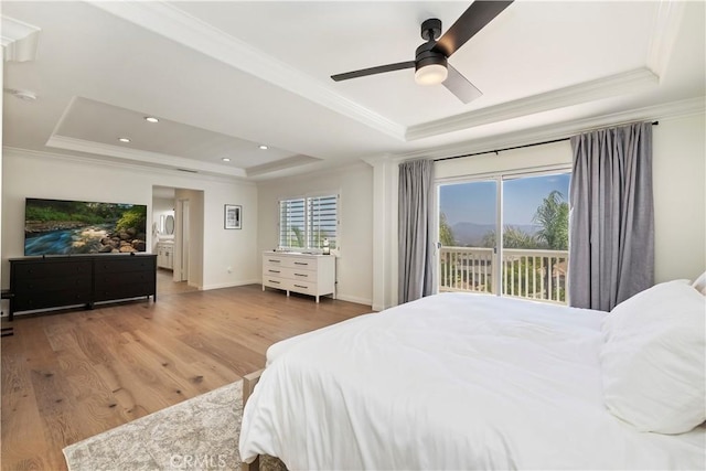 8581 Camino Limon Rd, Corona, CA 92883 - bedroom featuring a raised ceiling, access to exterior, ornamental molding, wood finished floors, and baseboards