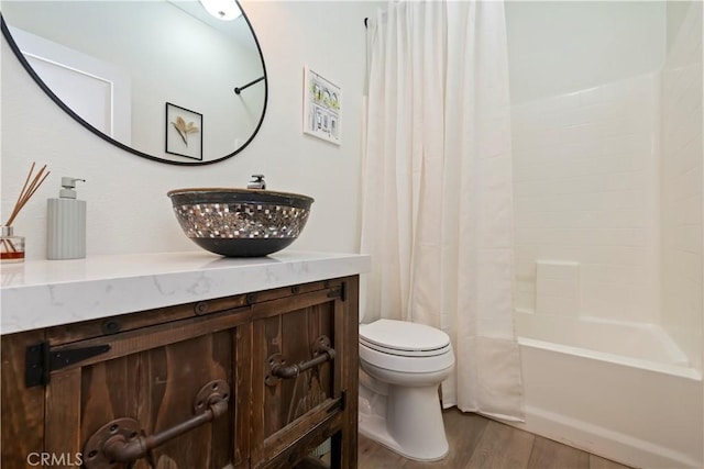 8581 Camino Limon Rd, Corona, CA 92883 - full bath with toilet, vanity, wood finished floors, and shower / bath combo