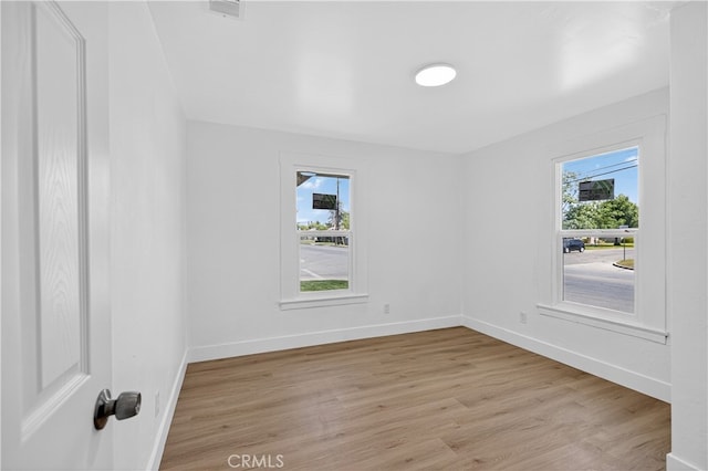 401 Cypress St, Bakersfield, CA 93304 - unfurnished room featuring light wood finished floors and baseboards