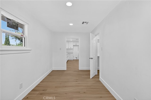401 Cypress St, Bakersfield, CA 93304 - hallway with recessed lighting and light wood-style floors