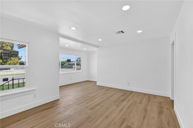 401 Cypress St, Bakersfield, CA 93304 - empty room featuring light wood-style floors and recessed lighting