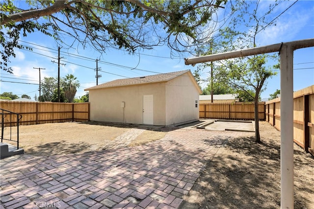 401 Cypress St, Bakersfield, CA 93304 - rear view of property with a fenced backyard, a patio area, and stucco siding