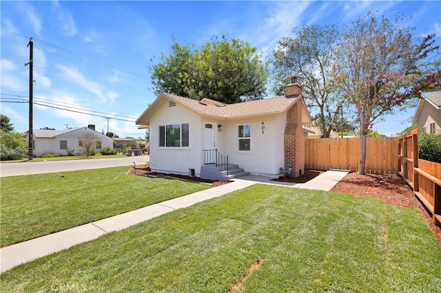 401 Cypress St, Bakersfield, CA 93304 - bungalow-style home with stucco siding and a chimney
