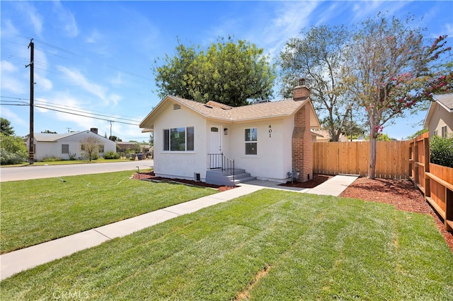 401 Cypress St, Bakersfield, CA 93304 - bungalow-style home featuring stucco siding and a chimney