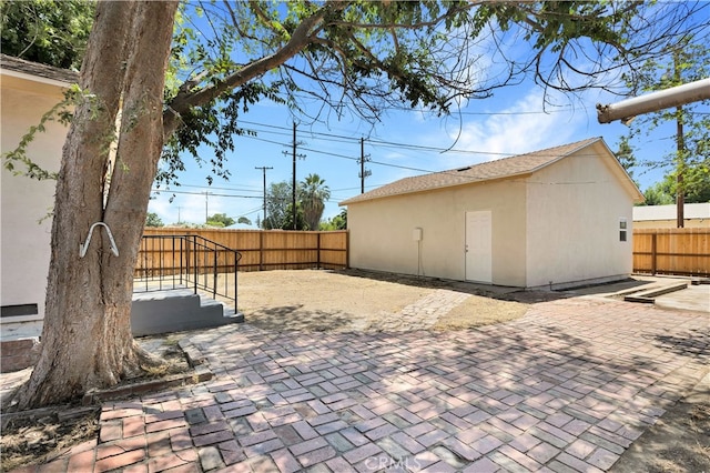 401 Cypress St, Bakersfield, CA 93304 - fenced backyard featuring a patio