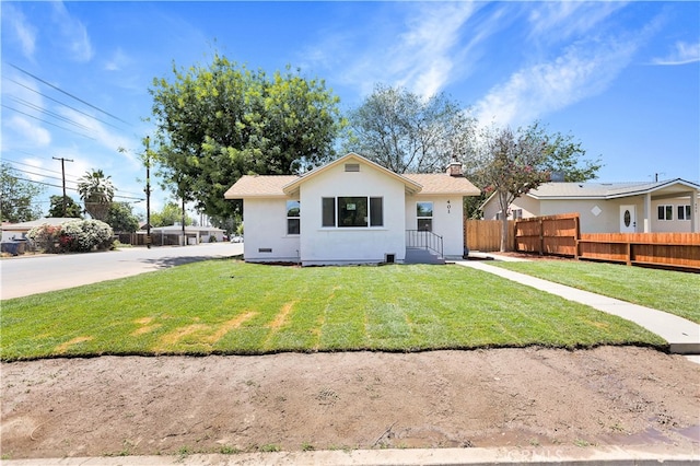 401 Cypress St, Bakersfield, CA 93304 - view of front of house with a chimney and stucco siding