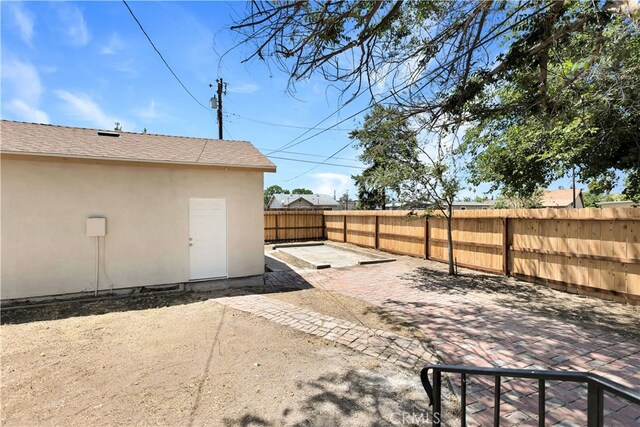 401 Cypress St, Bakersfield, CA 93304 - fenced backyard featuring a patio area