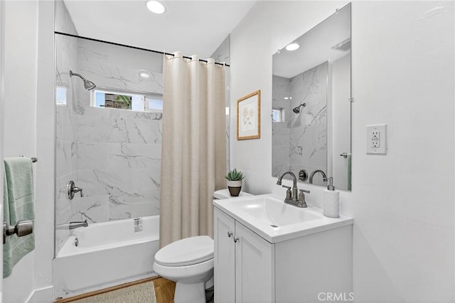 401 Cypress St, Bakersfield, CA 93304 - full bathroom with shower / bath combo with shower curtain, vanity, and recessed lighting