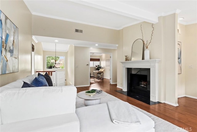 31 Aspen Way, Rolling Hills Estates, CA 90274 - living room with wood finished floors, ornamental molding, a fireplace with flush hearth, beam ceiling, and recessed lighting