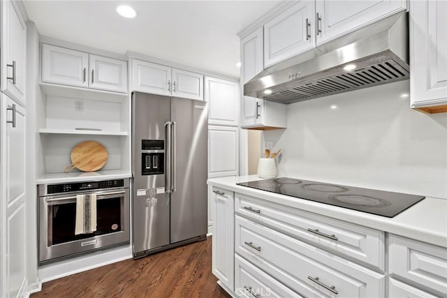 31 Aspen Way, Rolling Hills Estates, CA 90274 - kitchen featuring stainless steel appliances, under cabinet range hood, white cabinets, dark wood-style flooring, and light countertops