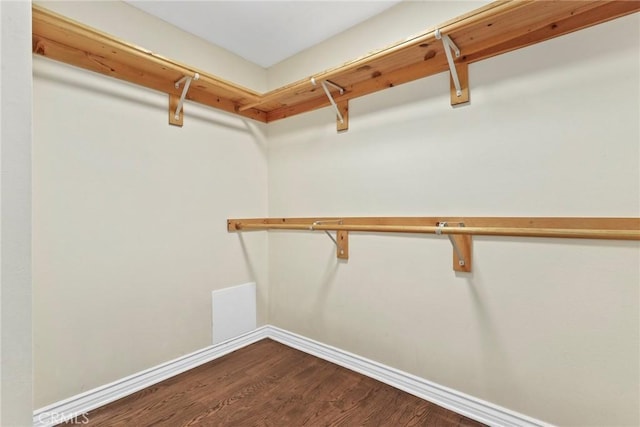 31 Aspen Way, Rolling Hills Estates, CA 90274 - walk in closet featuring dark wood-type flooring
