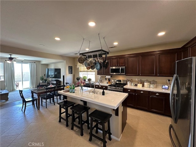 2408 Driftwood Dr, Rosamond, CA 93560 - kitchen featuring stainless steel appliances, a sink, healthy amount of natural light, light countertops, and recessed lighting