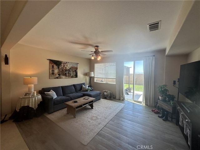 2408 Driftwood Dr, Rosamond, CA 93560 - living room with a ceiling fan and wood finished floors