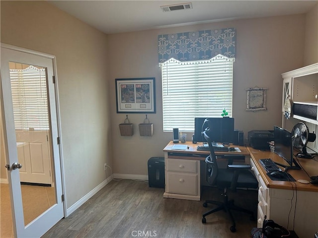 2408 Driftwood Dr, Rosamond, CA 93560 - home office with wood finished floors and baseboards