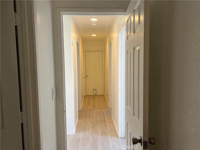 774 Josie St, Blythe, CA 92225 - hallway featuring light wood-type flooring, baseboards, and recessed lighting