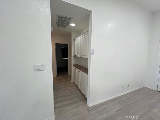 774 Josie St, Blythe, CA 92225 - hallway with light wood-style flooring, baseboards, and recessed lighting