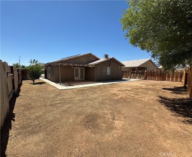 774 Josie St, Blythe, CA 92225 - rear view of property featuring french doors, a patio, and a fenced backyard