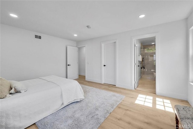626 Ritter St, Diamond Bar, CA 91765 - bedroom featuring light wood finished floors, recessed lighting, baseboards, and ensuite bath
