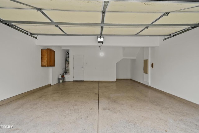 1542 Windshore Way, Oxnard, CA 93035 - garage with a garage door opener and baseboards