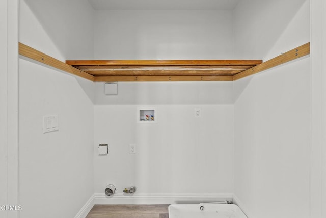 1542 Windshore Way, Oxnard, CA 93035 - laundry area featuring hookup for a gas dryer, washer hookup, wood finished floors, and electric dryer hookup