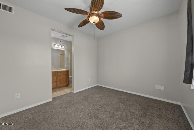 1542 Windshore Way, Oxnard, CA 93035 - unfurnished bedroom with light colored carpet, ensuite bathroom, and ceiling fan