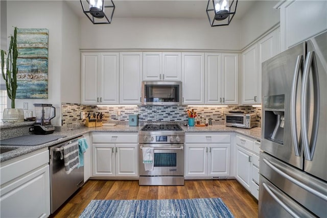 516 Stoneridge Dr, San Luis Obispo, CA 93401 - kitchen featuring appliances with stainless steel finishes, decorative backsplash, and white cabinetry