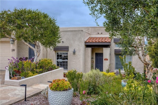 516 Stoneridge Dr, San Luis Obispo, CA 93401 - view of front facade featuring stucco siding and a tiled roof