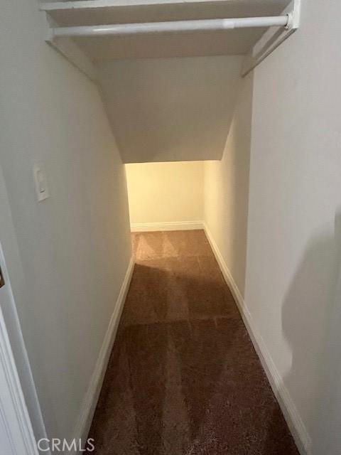 27657 Peninsula Dr Unit 131, Lake Arrowhead, CA 92352 - spacious closet featuring lofted ceiling and carpet