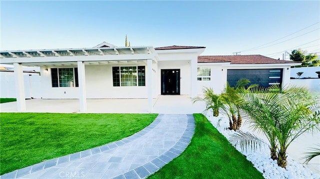 7401 Liberty Ave, Corona, CA 92881 - view of front of home featuring stucco siding and a patio area