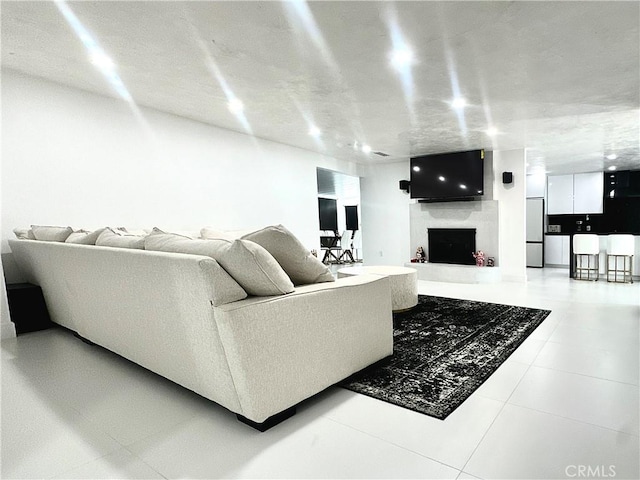 7401 Liberty Ave, Corona, CA 92881 - living room with a fireplace and tile patterned flooring