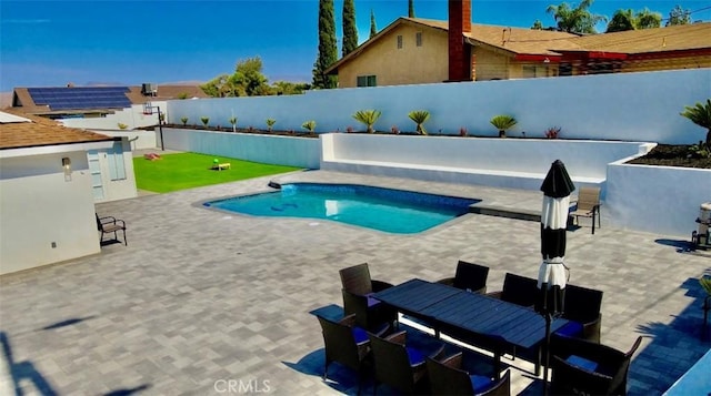 7401 Liberty Ave, Corona, CA 92881 - view of pool with a fenced backyard, a patio area, and outdoor dining space
